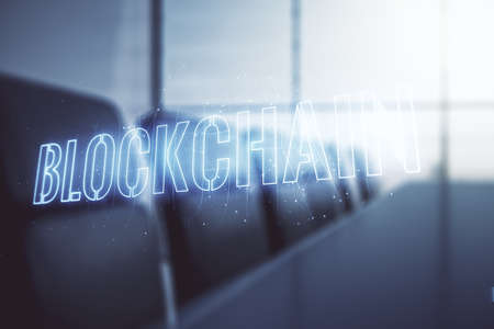Abstract virtual blockchain technology hologram on a modern coworking room background, cryptography and decentralization concept. Multi exposureの写真素材