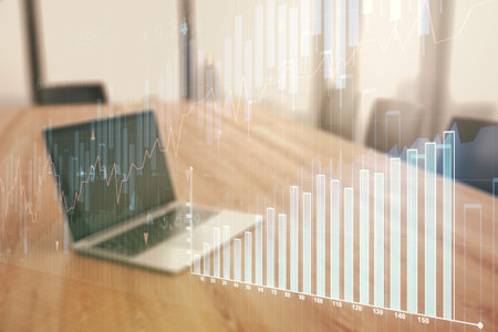 Multi exposure of abstract financial graph on laptop background, financial and trading concept