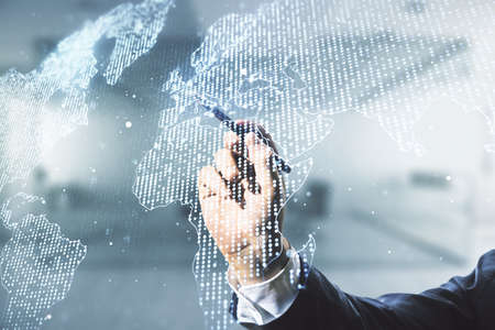 Multi exposure of man hand with pen working with abstract graphic world map on blurred office background, connection and communication conceptの写真素材
