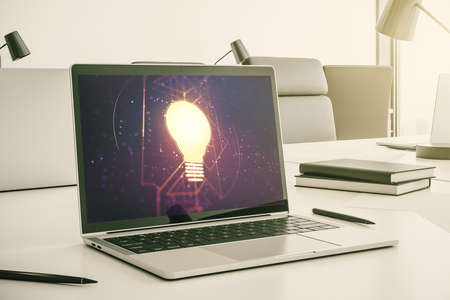 Creative light bulb illustration on modern computer monitor, future technology concept. 3D Renderingの写真素材