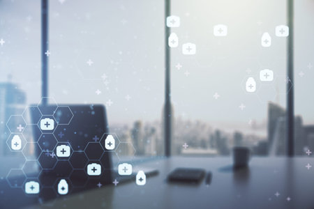 Double exposure of creative abstract medical hologram and modern desktop with laptop on background. Healthcare technolody conceptの写真素材