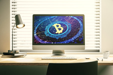 Modern computer display with creative Bitcoin symbol hologram. Mining and blockchain concept. 3D...