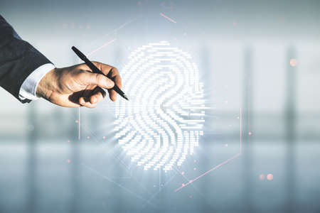 Double exposure of male hand with pen working with virtual creative fingerprint hologram on blurred office background, protection of personal information conceptの写真素材