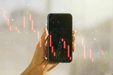 Double exposure of creative abstract global crisis chart with world map hologram and hand with cell phone on background. Financial crisis and recession conceptの写真素材
