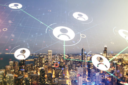 Double exposure of abstract virtual social network icons on Chicago city skyscrapers background....