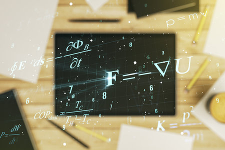 Creative scientific formula concept and modern digital tablet on background, top view. Multiexposureの写真素材