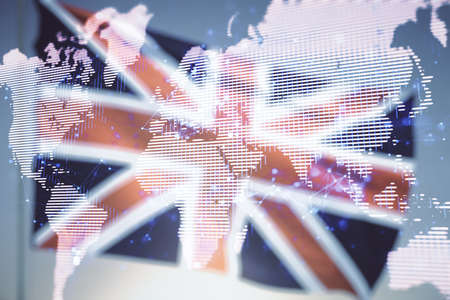 Double exposure of abstract digital world map on British flag and blue sky background, research and strategy conceptの写真素材