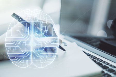 Creative artificial Intelligence concept with human brain hologram and hand writing in notebook on...