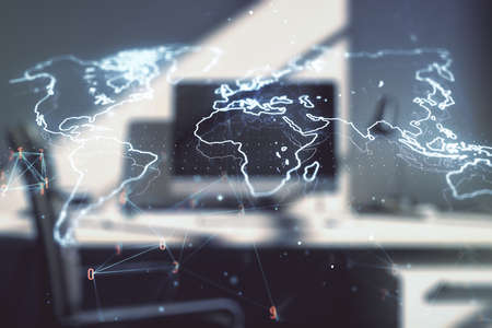 Double exposure of abstract digital world map and modern desktop with laptop on background, research and strategy conceptの写真素材