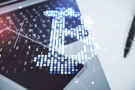 Double exposure of creative Bitcoin symbol with modern laptop on background. Cryptocurrency conceptの写真素材