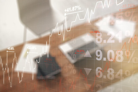 Double exposure of abstract creative financial chart and modern desktop with laptop on background,...