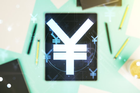 Double exposure of creative Japanese Yen symbol hologram and digital tablet on background, top view. Banking and investing conceptの写真素材