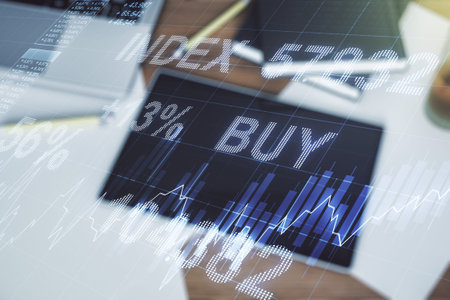 Multi exposure of abstract creative financial chart and digital tablet on background, top view,...