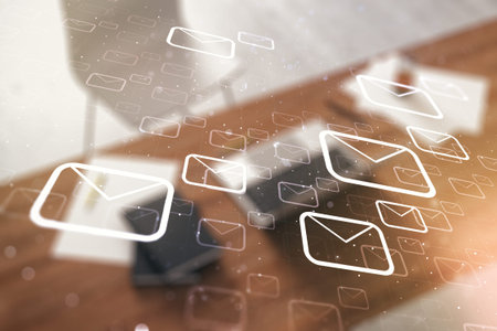 Double exposure of postal envelopes hologram and modern desktop with laptop on background....