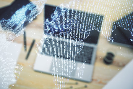 Multi exposure of abstract creative digital world map on modern laptop background, tourism and...