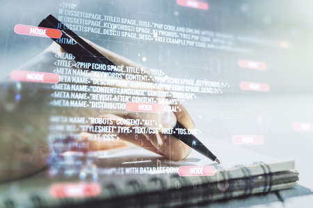 Abstract creative coding illustration with man hand writing in diary on background, software development concept. Multiexposureの写真素材