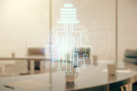 Virtual creative light bulb with chip hologram on a modern boardroom background, artificial Intelligence and neural networks concept. Multiexposureの写真素材