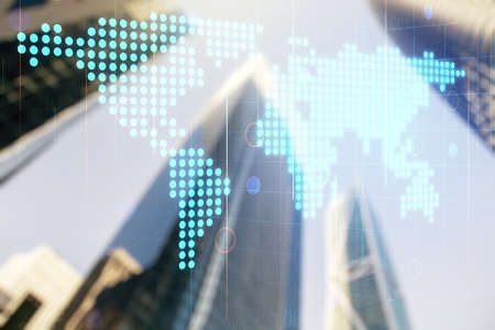 Multi exposure of abstract creative digital world map hologram on office buildings background, tourism and traveling conceptの写真素材