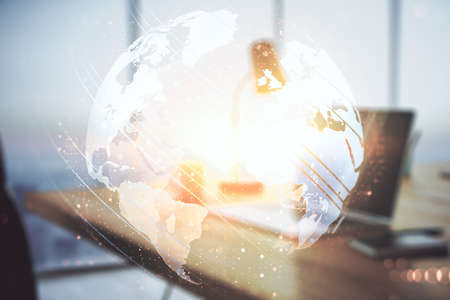 Multi exposure of abstract creative digital world map on modern laptop background, tourism and traveling conceptの写真素材