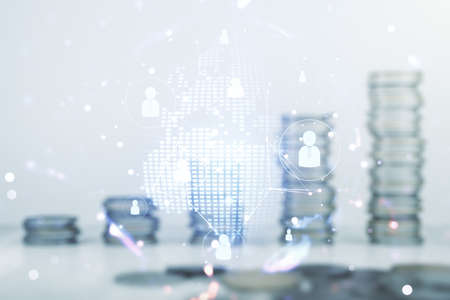 Virtual social network hologram and world map on stacks of coins background. Multiexposureの写真素材