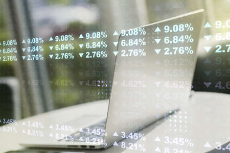 Double exposure of abstract creative statistics data hologram on computer background, analytics and forecasting conceptの写真素材