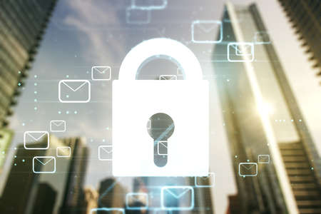 Double exposure of abstract virtual creative lock hologram with email symbols on modern skyscrapers background. Information security conceptの写真素材
