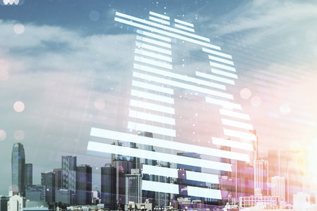 Double exposure of creative Bitcoin symbol hologram on Los Angeles office buildings background. Mining and blockchain conceptの写真素材