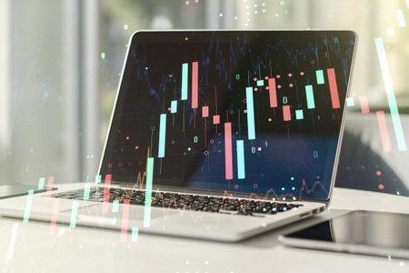 Double exposure of abstract creative financial chart on modern laptop background, research and...