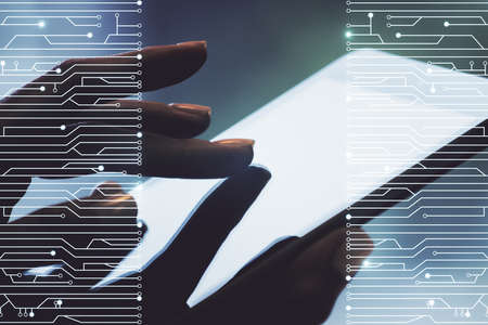 Creative abstract micro chip hologram and finger presses on a digital tablet on background, artificial intelligence and machine learning concept. Multi exposureの写真素材