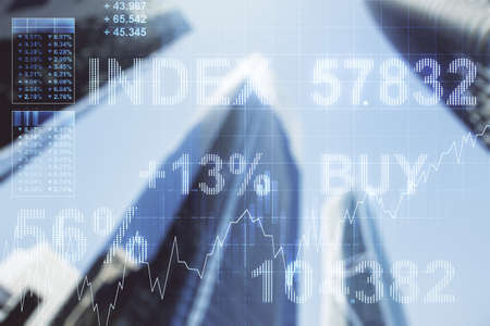 Double exposure of abstract financial graph on office buildings background, financial and trading conceptの写真素材