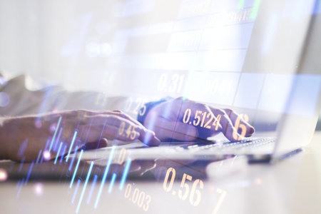 Multi exposure of abstract financial diagram with hand typing on computer keyboard on background,...