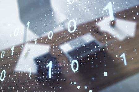 Double exposure of creative abstract binary code hologram and modern desktop with laptop on...