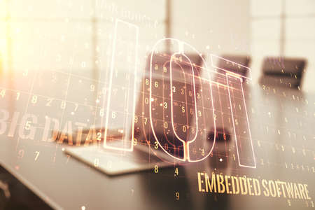 Double exposure of creative IOT hologram on laptop background, research and development conceptの写真素材