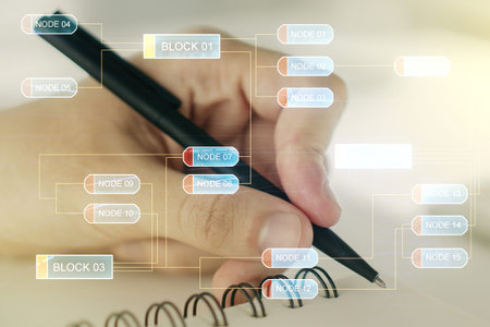 Double exposure of abstract programming language with man hand writing in notebook on background,...