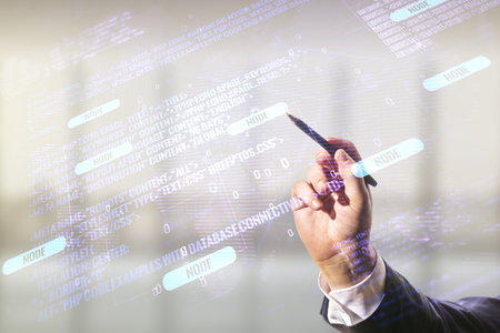 Man hand with pen working with abstract virtual coding concept and world map on blurred office background. Multiexposureの写真素材
