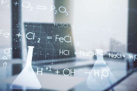Double exposure of creative chemistry concept on laptop background, research and development conceptの写真素材