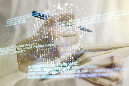 Creative concept of code skull illustration and man hand writing in notebook on background. Hacking and phishing concept. Multiexposureの写真素材