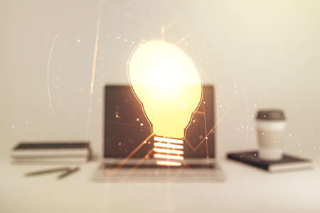 Creative light bulb illustration on modern computer background, future technology concept. Multiexposureの写真素材
