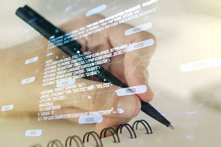 Multi exposure of abstract programming language hologram with man hand writing in notepad on background, artificial intelligence and machine learning conceptの写真素材
