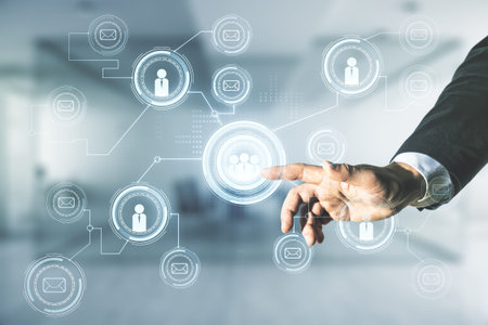 Double exposure of businessman hand working with social network icons on blurred office background....