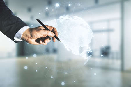 Double exposure of man hand with pen working with digital map of North America on blurred office background, research and strategy conceptの写真素材