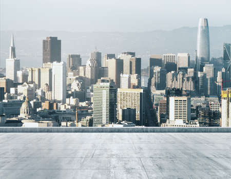 Empty concrete dirty rooftop on the background of a beautiful San Francisco city skyline at daytime, mock upの写真素材