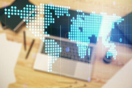 Abstract creative digital world map on modern computer background, globalization concept. Multiexposureの写真素材