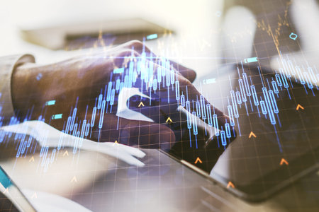 Double exposure of abstract creative financial chart with world map and with finger clicks on a...