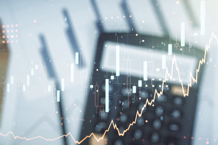 Abstract virtual financial graph hologram on calculator background, forex and investment concept....