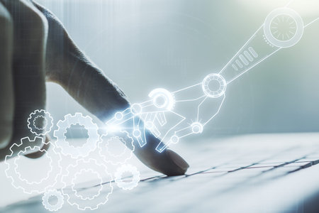 Creative abstract robotics technology hologram and hands typing on computer keyboard on background,...