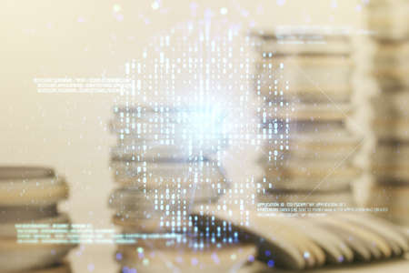 Abstract virtual code skull illustration on stacks of coins background. Hacking and phishing concept. Multiexposureの写真素材