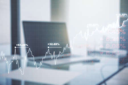 Multi exposure of abstract financial graph on laptop background, financial and trading conceptの写真素材