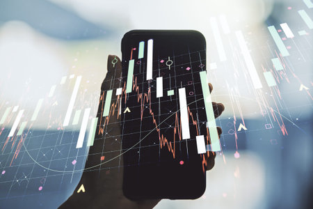 Multi exposure of abstract creative financial graph and hand with phone on background, forex and...