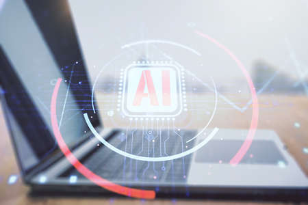 Double exposure of creative artificial Intelligence abbreviation with computer on background. Future technology and AI conceptの写真素材